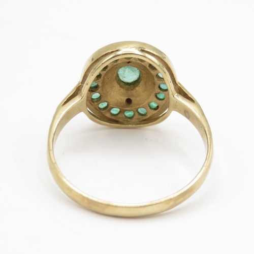 33 - 9ct gold emerald and diamond halo ring (2.7g) Size N