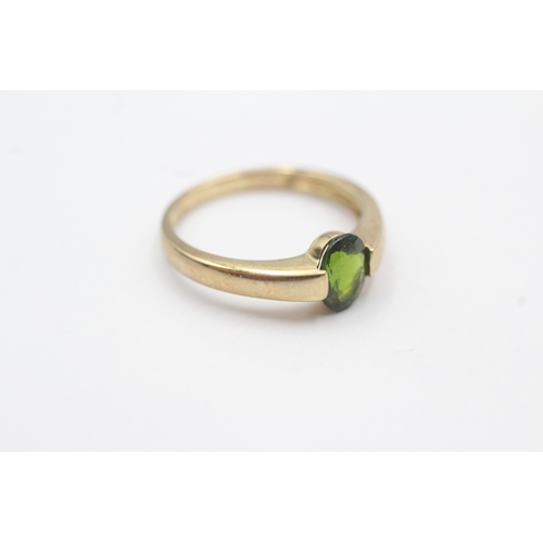 39 - 9ct gold diospore dress ring (2.1g) Size L