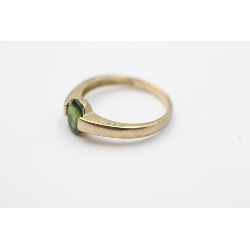 39 - 9ct gold diospore dress ring (2.1g) Size L