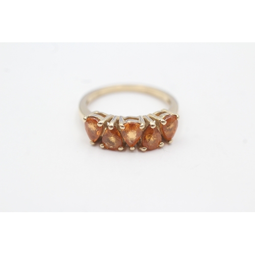 41 - 9ct gold spessartine garnet dress ring (2.7g) Size K