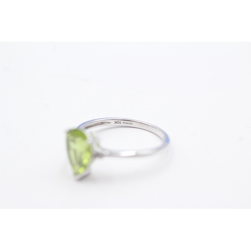 54 - 9ct gold pear cut peridot & white gemstone dress ring (1.8g) Size N