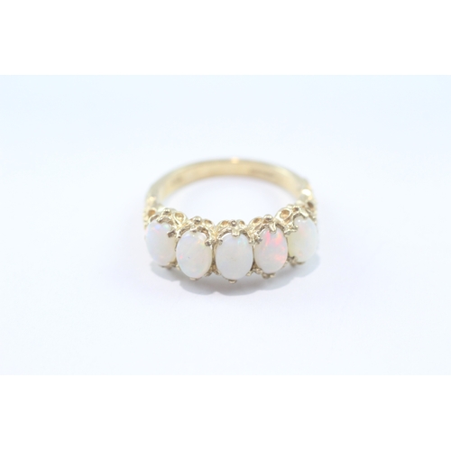 48 - 9ct gold five stone opal ring (3.6g) Size N