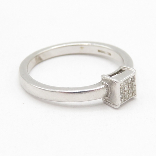 129 - 9ct white gold square set diamond ring (3.1g) size N 1/2