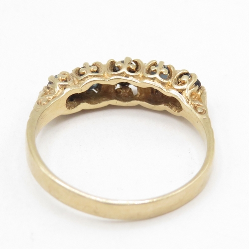 138 - 9ct gold sapphire five stone ring (2.3g) size N