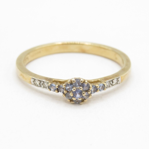 143 - 9ct gold diamond and tanzanite ring (2.2g) size T 1/2