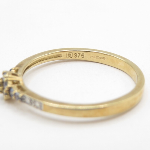 143 - 9ct gold diamond and tanzanite ring (2.2g) size T 1/2