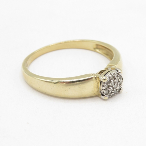 148 - 9ct gold diamond cluster ring (2.6g) size S 1/2