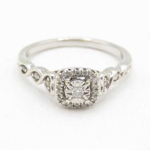 155 - 9ct white gold diamond ring with heart details (2.4g) size L