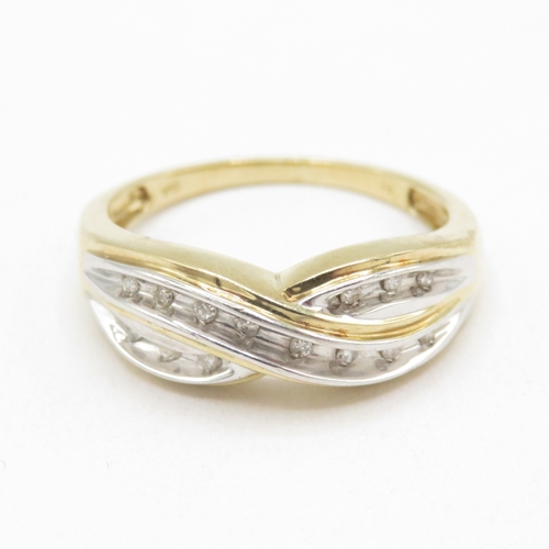 161 - 9ct gold diamond crossover ring (2.8g) size Q