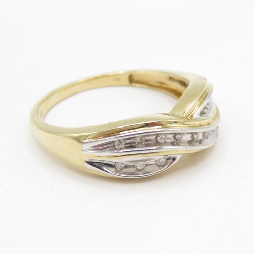 161 - 9ct gold diamond crossover ring (2.8g) size Q