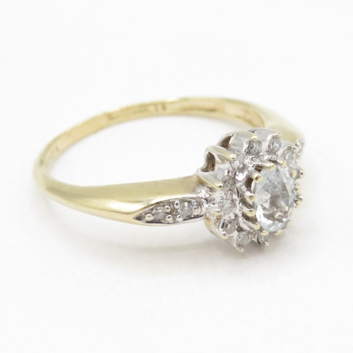 172 - 9ct gold topaz and diamond halo cluster ring (2.7g) size P 1/2