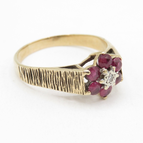 173 - 9ct gold ruby and diamond floral cluster ring (3.1g) size U