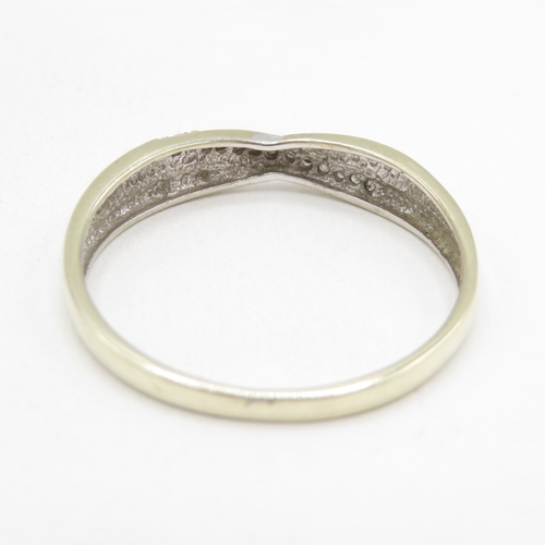 177 - 9ct gold diamond twist ring (1.7g) size T 1/2