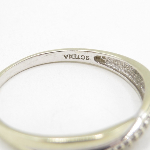177 - 9ct gold diamond twist ring (1.7g) size T 1/2