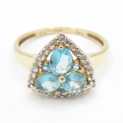 242 - 9ct gold topaz and diamond ring (2.4g) size O 1/2