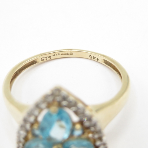 242 - 9ct gold topaz and diamond ring (2.4g) size O 1/2