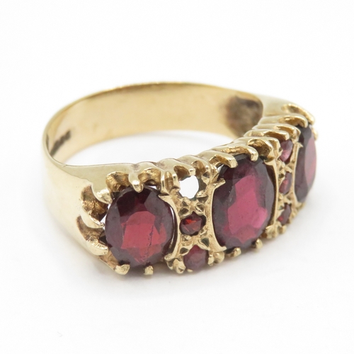 246 - Chunky 9ct gold garnet ring - stone missing (3.8g) size P
