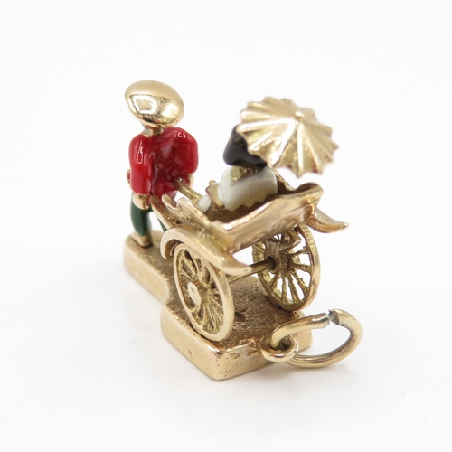 248 - 9ct gold rickshaw charm with enamel details (6g)