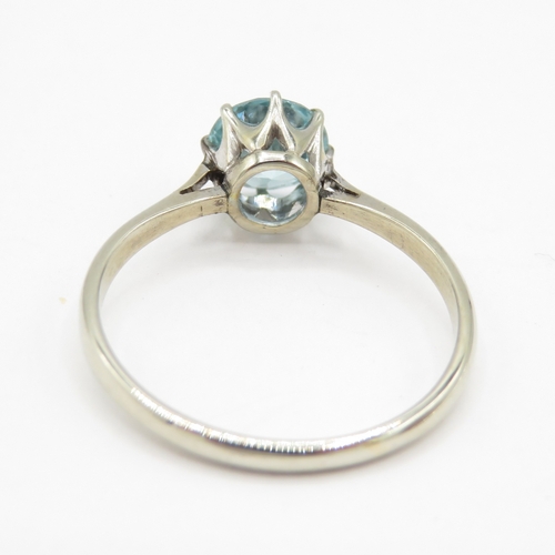 254 - 9ct gold blue topaz solitaire ring (1.3g) size K