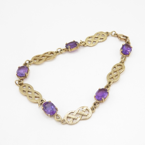 258 - 9ct gold amethyst Celtic style bracelet (8g)