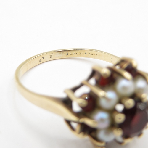 261 - 9ct gold garnet and pearl floral cluster ring (2.3g) size J 1/2