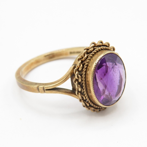 265 - 9ct gold amethyst solitaire ring with filigree details (3.1g) size N