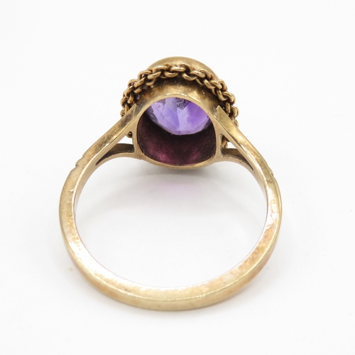 265 - 9ct gold amethyst solitaire ring with filigree details (3.1g) size N