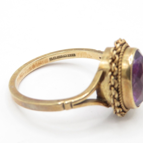 265 - 9ct gold amethyst solitaire ring with filigree details (3.1g) size N