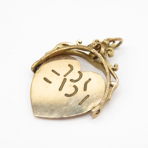 267 - 9ct gold heart spinner fob charm / pendant (2.9g)