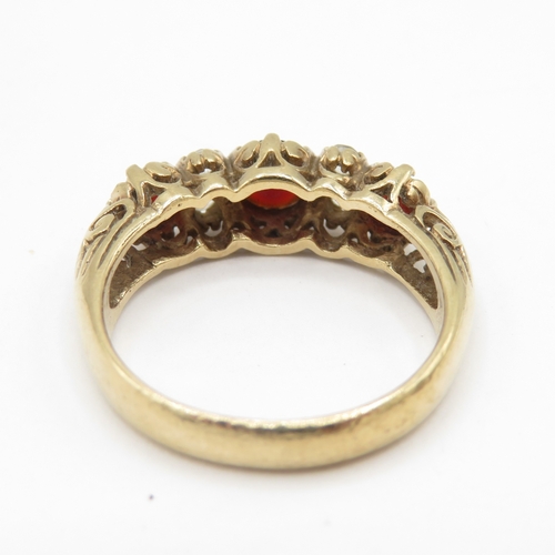281 - 9ct gold garnet and white gemstone boat ring (3.9g) size P