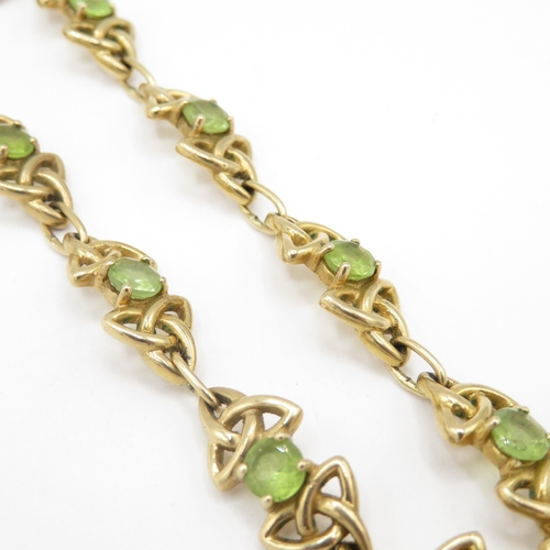 285 - 9ct gold peridot Celtic link bracelet (11.4g)