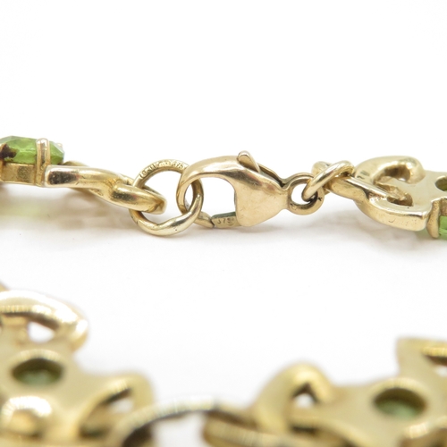 285 - 9ct gold peridot Celtic link bracelet (11.4g)