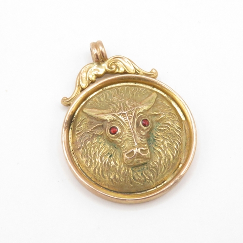292 - 9ct gold pendant of cow with red enamel eyes presented to BRO.WM.STANBROOK K.O.M by the sir Herbert ... 