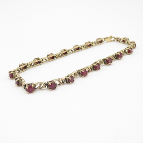 293 - 9ct gold ruby link bracelet (7.4g)