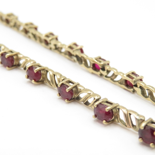 293 - 9ct gold ruby link bracelet (7.4g)