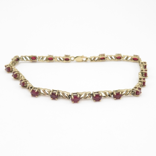 293 - 9ct gold ruby link bracelet (7.4g)