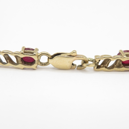 293 - 9ct gold ruby link bracelet (7.4g)