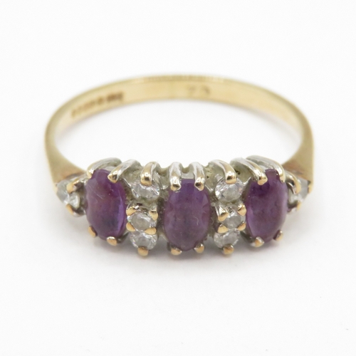 296 - 9ct gold purple and white gemstone ring (1.7g) size N