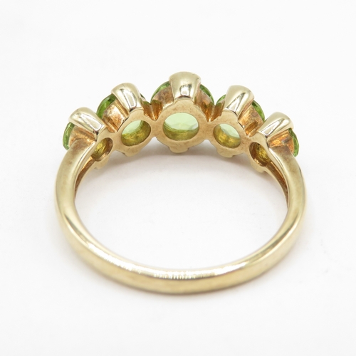 43 - 9ct gold five stone peridot ring (3.5g) size O