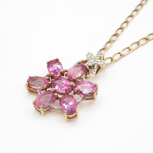 55 - 9ct gold diamond and pink topaz pendant on chain (5.3g)