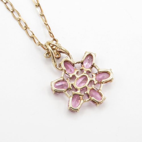 55 - 9ct gold diamond and pink topaz pendant on chain (5.3g)