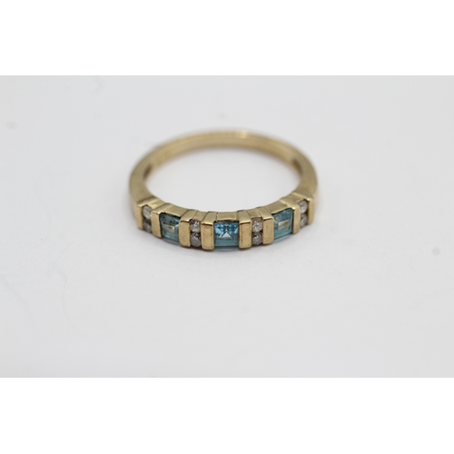 23 - 9ct gold diamond and topaz dress ring (1.9g) Size L