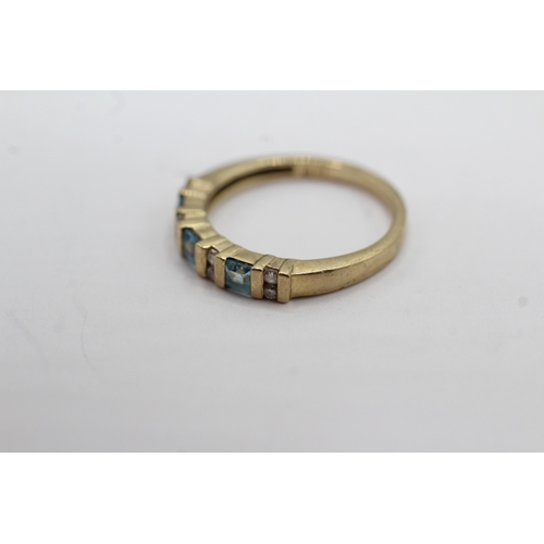 23 - 9ct gold diamond and topaz dress ring (1.9g) Size L
