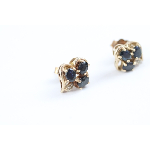 24 - 9ct gold sapphire & diamond stud earrings (2.2g)
