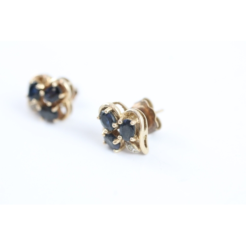 24 - 9ct gold sapphire & diamond stud earrings (2.2g)