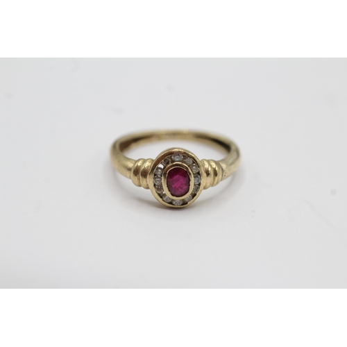 29 - 9ct gold diamond and ruby halo ring (1.3g) Size H 1/2