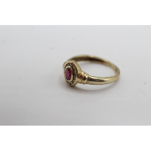 29 - 9ct gold diamond and ruby halo ring (1.3g) Size H 1/2