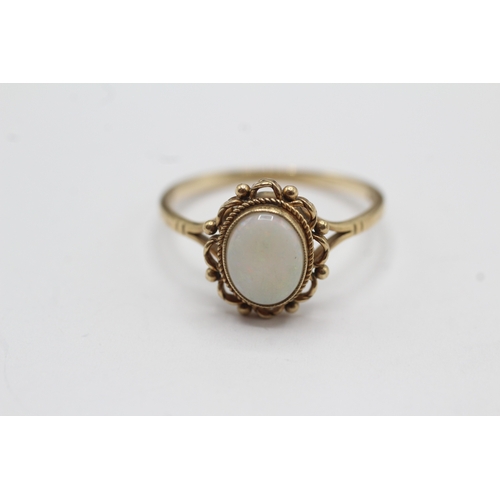 34 - 9ct gold opal cabochon ring (2.8g) Size U