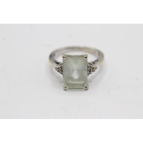 45 - 9ct gold diamond and prasiolite cocktail ring (3.5g) Size L