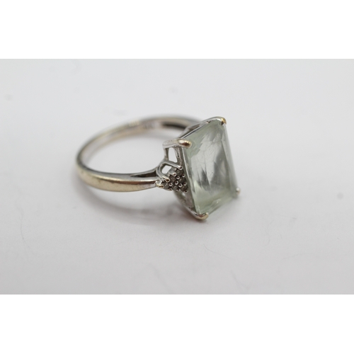 45 - 9ct gold diamond and prasiolite cocktail ring (3.5g) Size L